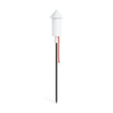 Slim white cone-topped solar lamp on a tall dark ground spike with a red cord — Racket la Surprise Solar Lamp by Fatboy