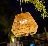 Sisine Portable Pendant Light - lit in a garden
