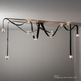 SNAPS LED Chandelier, shown in Modern Brass, Black Leather & Pressed Glass, by Hubbardton Forge