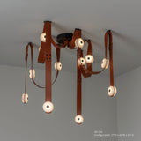 SNAPS LED Chandelier, shown in Black, Chestnut Leather & Alabaster, by Hubbardton Forge