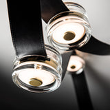 SNAPS LED Chandelier detail in Modern Brass, Black Leather & Pressed Glass, by Hubbardton Forge