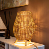 Saona Table Lamp - Indoor Only, lit on a console