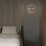 Saturn Round Wall Sconce By Page One Medium Lifestyle View1