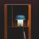 Sensa Battery Table Lamp - Smoky Teal, in a bookcase