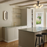 Silver Large Sassi LED Wall Sconce by Nuura in Dining Area