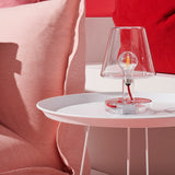 Transloetje Table Lamp - Transparent, on a side table