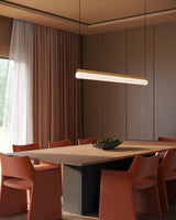 Vintage Brass Nio Linear Pendant by Kuzco Lighting in Dining Room