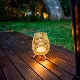 Bossa Portable Table Lamp - on a deck at dusk