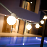 Bruna Solar String Lights - strung across a terrace