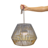 Conta Portable Pendant Light - Taupe, held by its strap