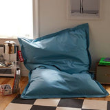 Original Slim Bean Bag - Petrol, in a living room