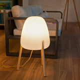 Rocket Floor Lamp - Small, beside a sofa