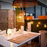 Stella Solar String Lights - over an outdoor dining table
