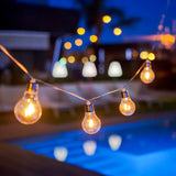 Stella Solar String Lights - lit by a pool