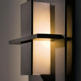 Aperture Vertical Wall Sconce by Hubbardton Forge, Finish: Mahogany-Hubbardton Forge, Bronze, Dark Smoke-Hubbardton Forge, Burnished Steel-Hubbardton Forge, Black, Natural Iron-Hubbardton Forge, Gold, Vintage Platinum-Hubbardton Forge, Soft Gold-Hubbardton Forge, Sterling-Hubbardton Forge, Glass Color: Topaz Art Glass, White Art Glass, | Casa Di Luce Lighting