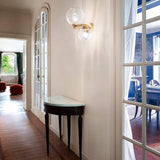 Puppet Ring Wall Light by Vistosi in hallway