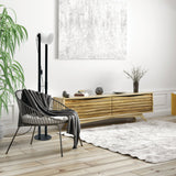 Hornwood 1 Floor Lamp By Eglo - Black Color behind the chair