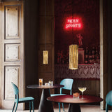 Gold Accordeon Vertical Suspension in Restaurant