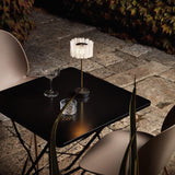 Black Accordeon Battery Table Lamp in Restaurant