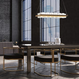 Bruco Chandelier By Eurofase - Gold Hanging Above Table