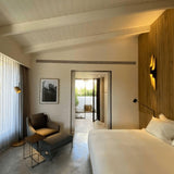 Black Matte Coltrane Wall Sconce in Bedroom