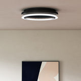 Calix Flushmount by Kuzco - Black, Hanging on white canopy