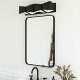 Cubix Vanity Light by Kuzco - 4 Lights, Black/White above on mirror