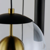 Black/Natural Aged Brass Nucleus 3 Light Suspension