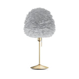 Eos Evia Table Lamp by Umage – Medium, Lampshade Grey, Table stand Brushed Brass installed in the living room or bedroom