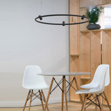 Iris Round Suspension By Egoluce Black Hanging Above Table