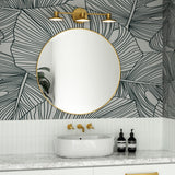 Issa Vanity Light by Alora Mood - Brushed Gold fixed above the mirror