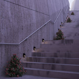Jackson Outdoor Step Light by Kuzco - Black, Fixed on wall near stairs