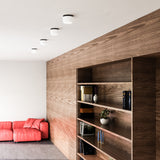 Mel Flush Mount by Kuzco - Black/Opal Glass, Fixed on white canopy