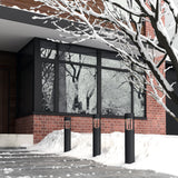 Novato Outdoor Bollard by Kuzco - Large, Black fixed on ground outside home