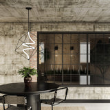 Script LED Pendant Light By Kuzco - Hanging Above Table