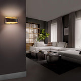 Bronze/Brushed Brass Swerve Wall Sconce in Living Room