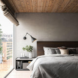 Steel Archer Wall Lamp in Bedroom