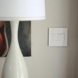 Adorne Two-Gang Screwless Wall Plate by Legrand Adorne, Color: Black Ink-Legrand Adorne, Bleu Noir-Legrand Adorne, Bronze-Legrand Adorne, Carnival-Legrand Adorne, Gloss White, Gloss White On White-Legrand Adorne, Golden Sands-Legrand Adorne, Graphite-Legrand Adorne, Greige-Legrand Adorne, Hibiscus-Legrand Adorne, Magnesium-Legrand Adorne, Pale Blue-Legrand Adorne, Powder White-Legrand Adorne, Satin Light Almond-Legrand Adorne, Titanium-Legrand Adorne, , | Casa Di Luce Lighting