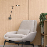 Rotaire Arm Wall Sconce in living room