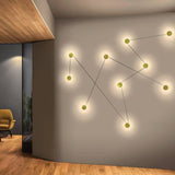 Azou Wall Installation by Kundalini, Finish: White Marble, Black Marble, Green Onyx, Number of Lights: 3 Light (For All Finishes), 5 Light (For White and Black Marble), 7 Light (For White and Black Marble), 5 Light (For Green onyx), 7 Light (For Green onyx), | Casa Di Luce Lighting