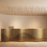A-Tube Nano Swing Ceiling Light by Lodes in Reception Area