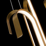 Aged Brass Seahorse 4CCT Multi-Light Suspension by Modern Forms in Zoomed View