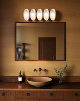 Antique White 26inch Cortez Wall/Vanity Light by Alora Lighting in Bathroom