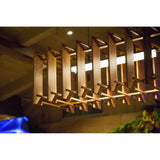 Arca Linear Pendant by Cerno in walnut, close view of the illuminated slats