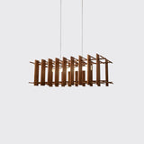 Arca Linear Pendant by Cerno in walnut and brushed aluminum, lit