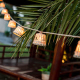 Aurora Solar String Lights - strung across a terrace