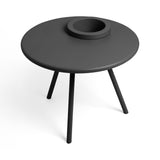 Round dark grey side table on three slim tapered legs, with an integrated recessed circular planter well — Bakkes Side Table & Planter by Fatboy