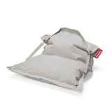 Light grey woven lounger bean bag with adjustable straps and metal eyelet grommets — Buggle-up Olefin Bean Bag by Fatboy
