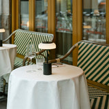 Black/Opal Blossi Mini Portable Table Lamp by Nuura in Restaurant