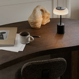 Black/Opal Blossi Mini Portable Table Lamp by Nuura in Study Room